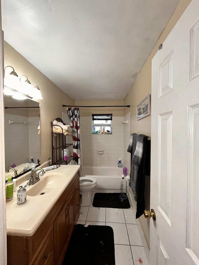 full bathroom featuring tile patterned flooring, toilet, vanity, and shower / bath combo