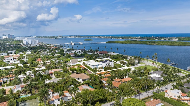 birds eye view of property featuring a water view