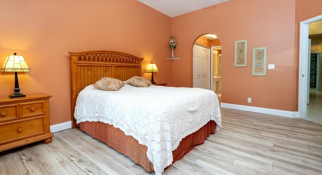 bedroom with light hardwood / wood-style floors