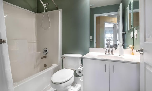 full bathroom featuring toilet, vanity, and shower / tub combo with curtain