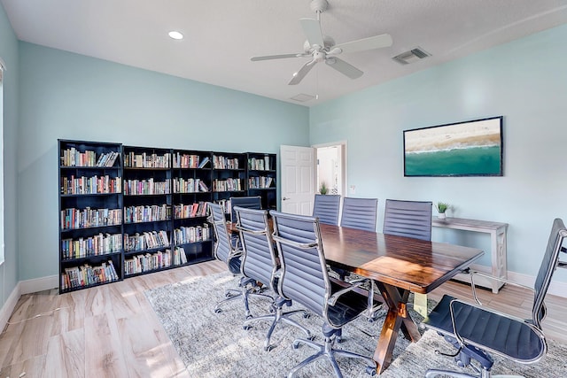 home office featuring ceiling fan and hardwood / wood-style floors