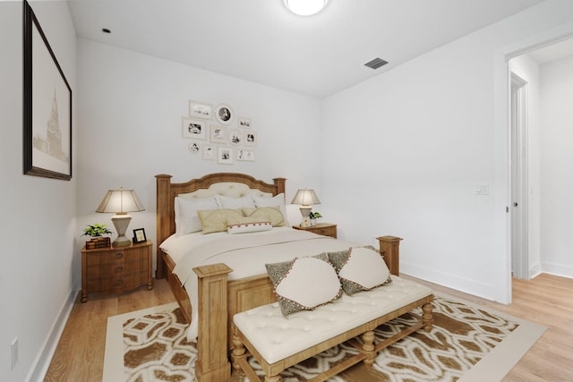 bedroom featuring light wood-type flooring