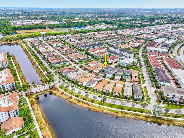 drone / aerial view featuring a water view