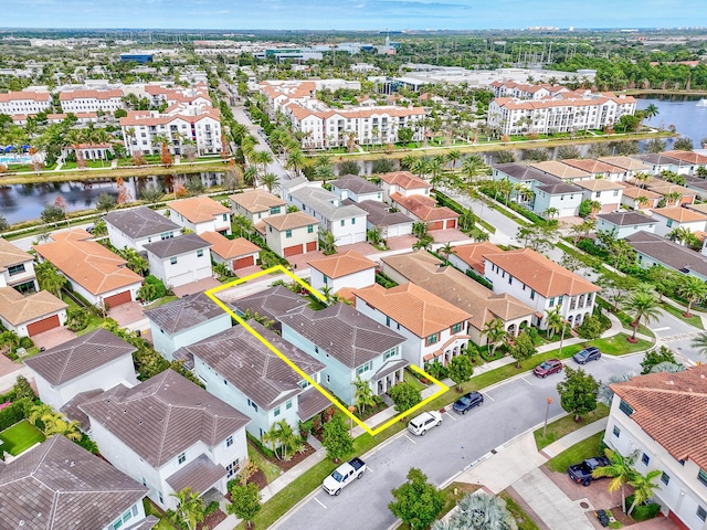 drone / aerial view with a water view