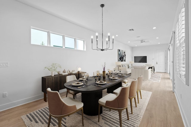 dining area with light wood-type flooring