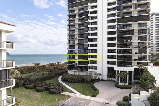 view of building exterior featuring a water view