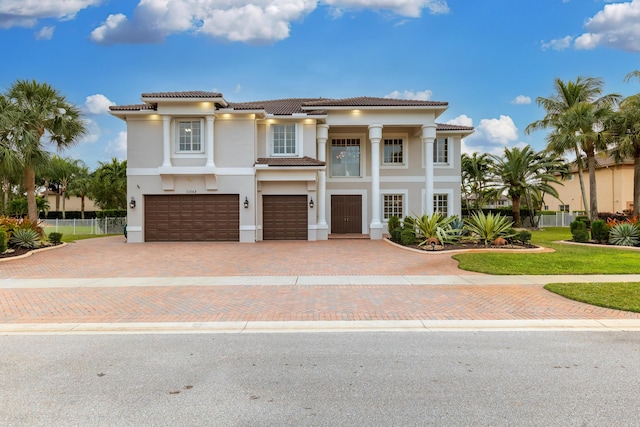 view of front of property with a garage