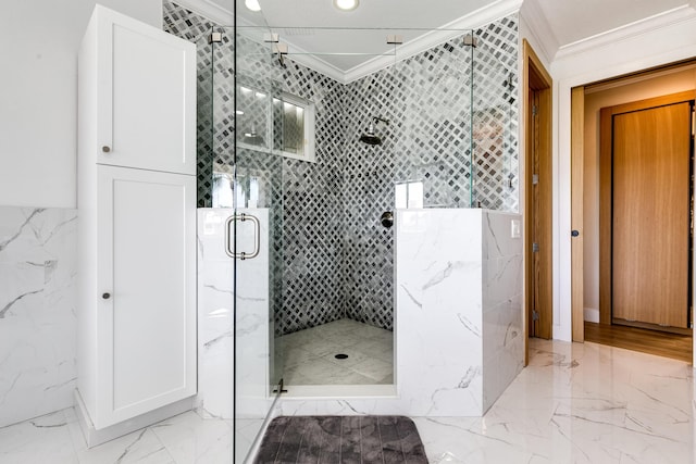 bathroom with a shower with door and ornamental molding