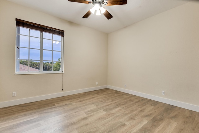 unfurnished room with ceiling fan and light hardwood / wood-style floors