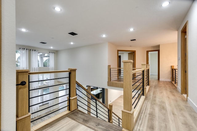 hall with light wood-type flooring