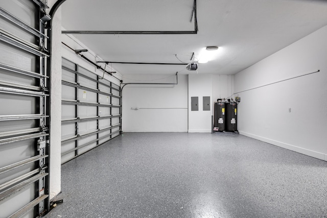 garage with water heater, a garage door opener, and electric panel