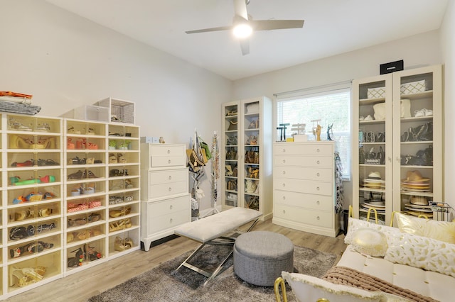 interior space with ceiling fan and light hardwood / wood-style floors