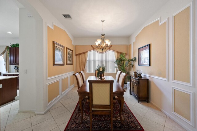 full bathroom with shower / bathtub combination with curtain, vanity, toilet, and tile patterned flooring