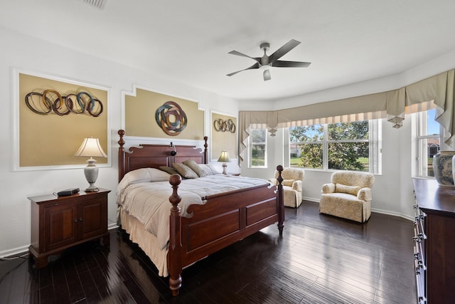 bedroom featuring dark wood-type flooring and ceiling fan