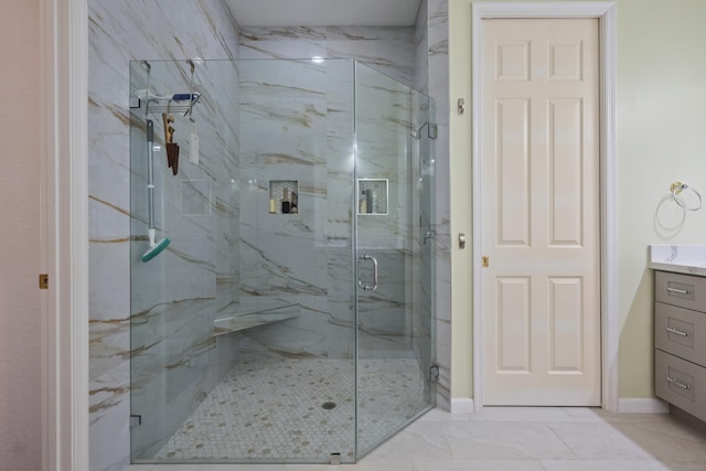 bathroom with vanity and an enclosed shower