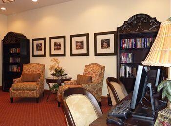 sitting room with carpet floors