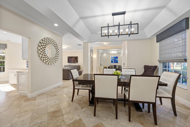 dining room with a chandelier