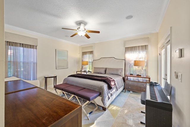 bedroom with ceiling fan, ornamental molding, and a textured ceiling