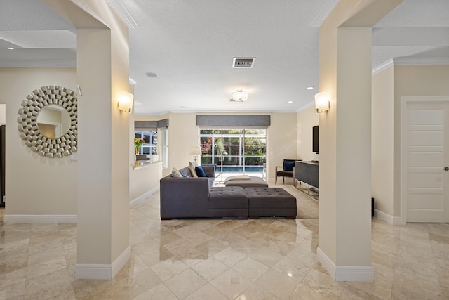 living room with crown molding and a textured ceiling