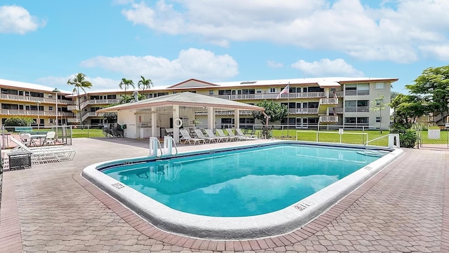 view of pool featuring a patio area