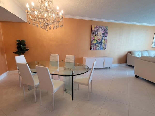 tiled dining room featuring a notable chandelier, a textured ceiling, and ornamental molding