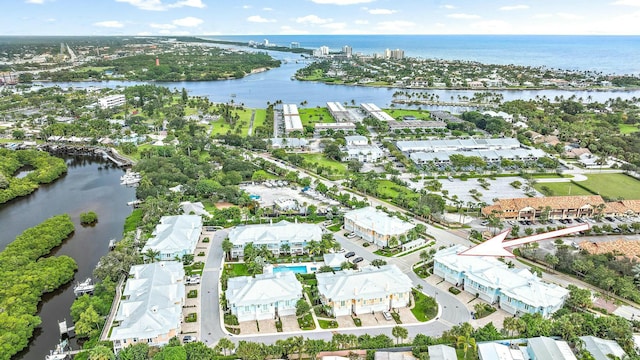 bird's eye view with a water view