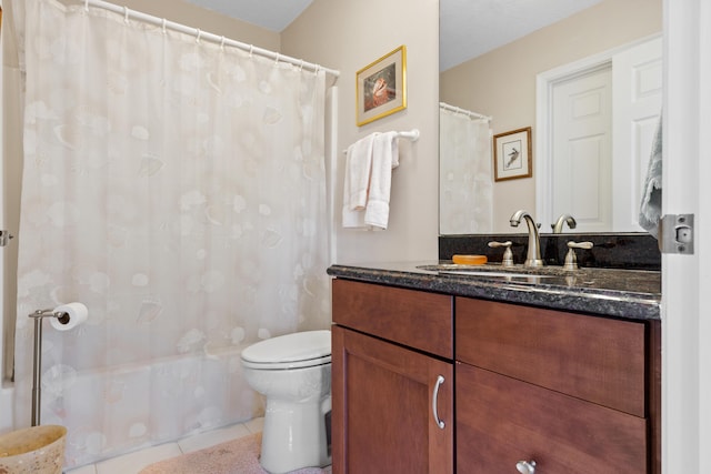 full bathroom featuring vanity, shower / tub combo with curtain, tile patterned floors, and toilet