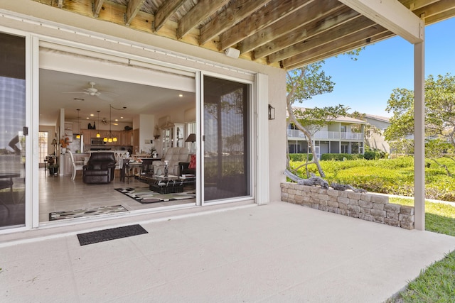 view of patio / terrace featuring ceiling fan