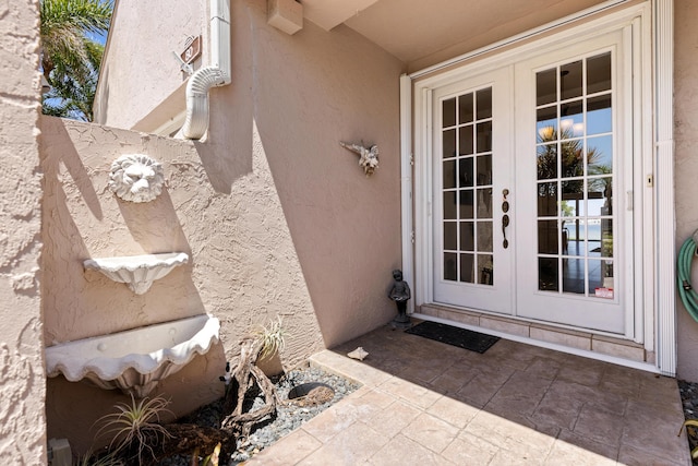 doorway to property featuring french doors