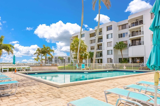 view of swimming pool featuring a patio area