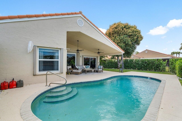 view of swimming pool featuring ceiling fan, a patio area, and outdoor lounge area