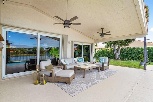 view of patio / terrace with ceiling fan and outdoor lounge area