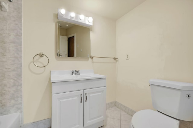 bathroom featuring toilet, tile patterned flooring, and vanity