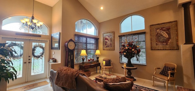 interior space with recessed lighting, a chandelier, high vaulted ceiling, tile patterned flooring, and french doors