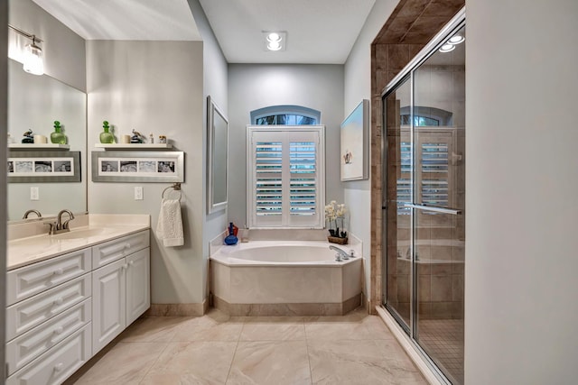 bathroom featuring vanity, separate shower and tub, and tile patterned flooring