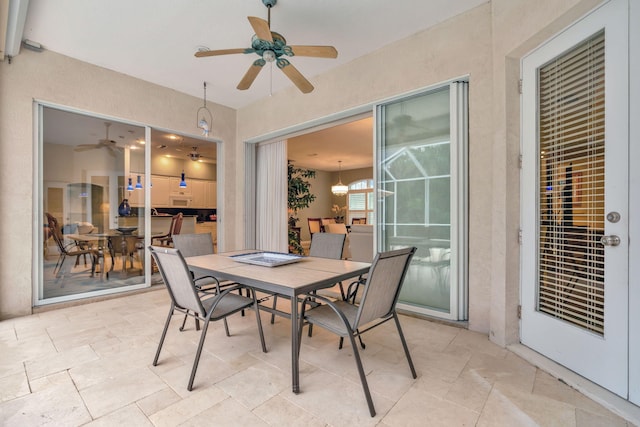 view of patio / terrace featuring ceiling fan