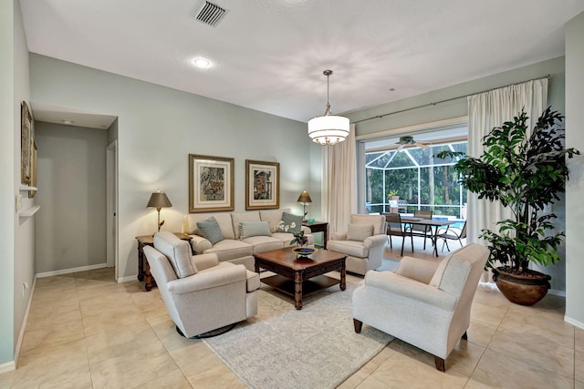 living room with light tile patterned floors