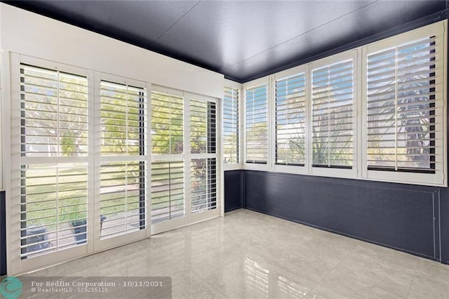 view of unfurnished sunroom