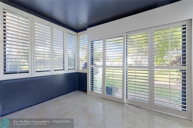 view of tiled spare room