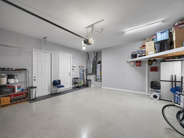 garage featuring a garage door opener, heating unit, and gas water heater