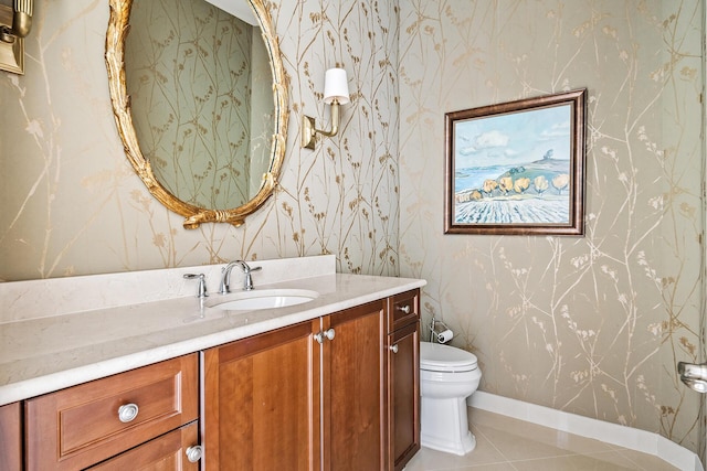 bathroom featuring toilet, tile patterned flooring, and vanity