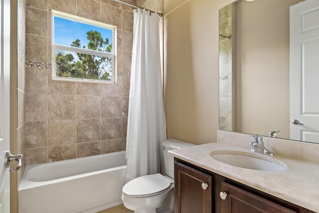 full bathroom with toilet, shower / bath combo, and vanity