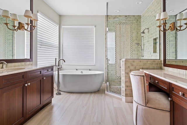 bathroom featuring vanity and plus walk in shower