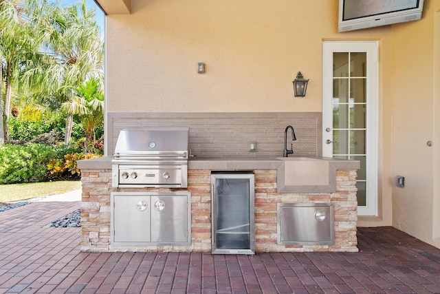 view of patio featuring area for grilling and grilling area