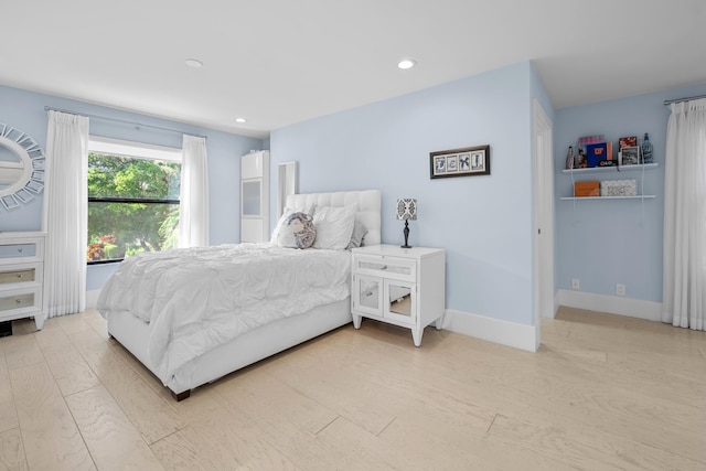 bedroom featuring light hardwood / wood-style floors