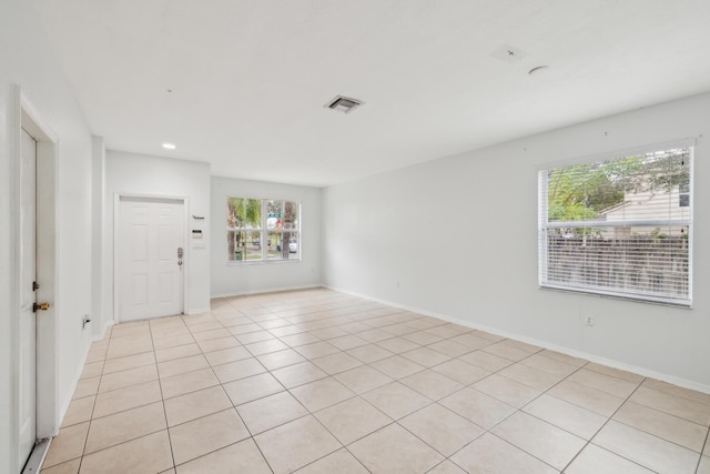 view of tiled spare room