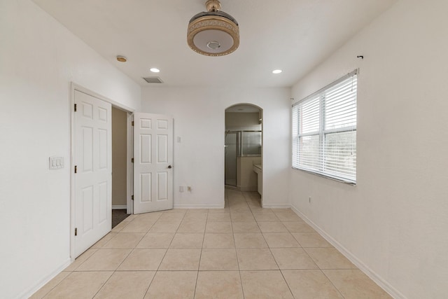 interior space with light tile patterned floors