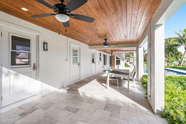 view of patio / terrace featuring ceiling fan