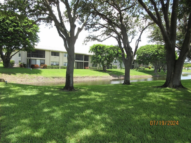 view of yard with a water view