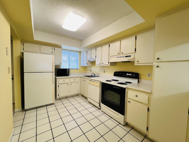 kitchen featuring white appliances, white cabinets, a textured ceiling, sink, and light tile patterned floors